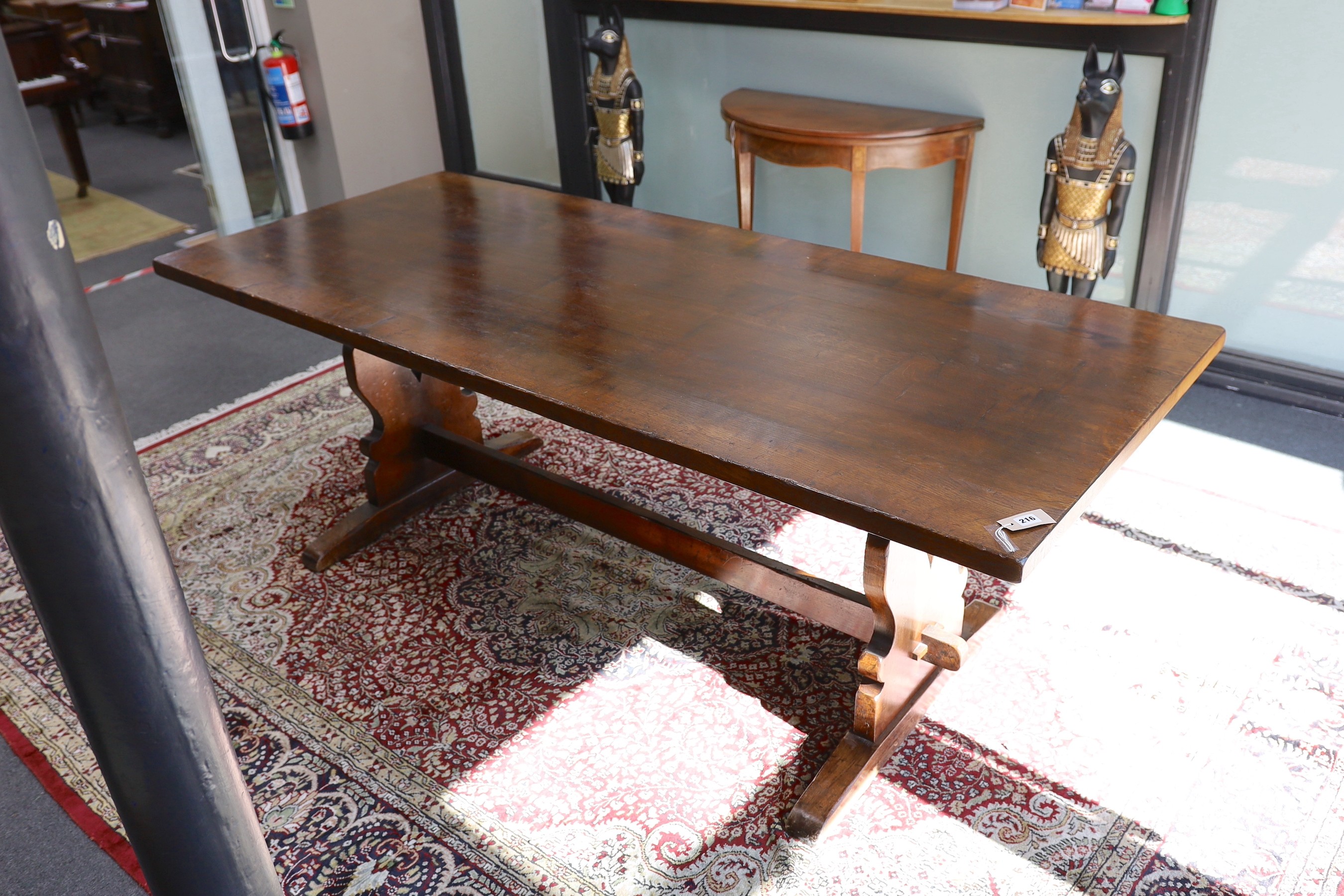 A Titchmarsh and Godwin rectangular oak refectory dining table, length 213cm, width 90cm, height 78cm
